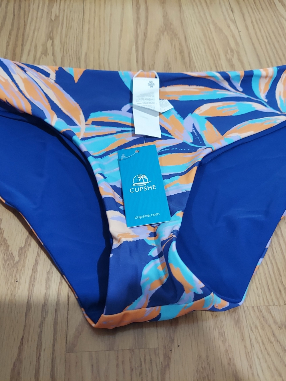 CUPSHE Blue Tropical Leaf Print Bikini Bottom with Orange Accents